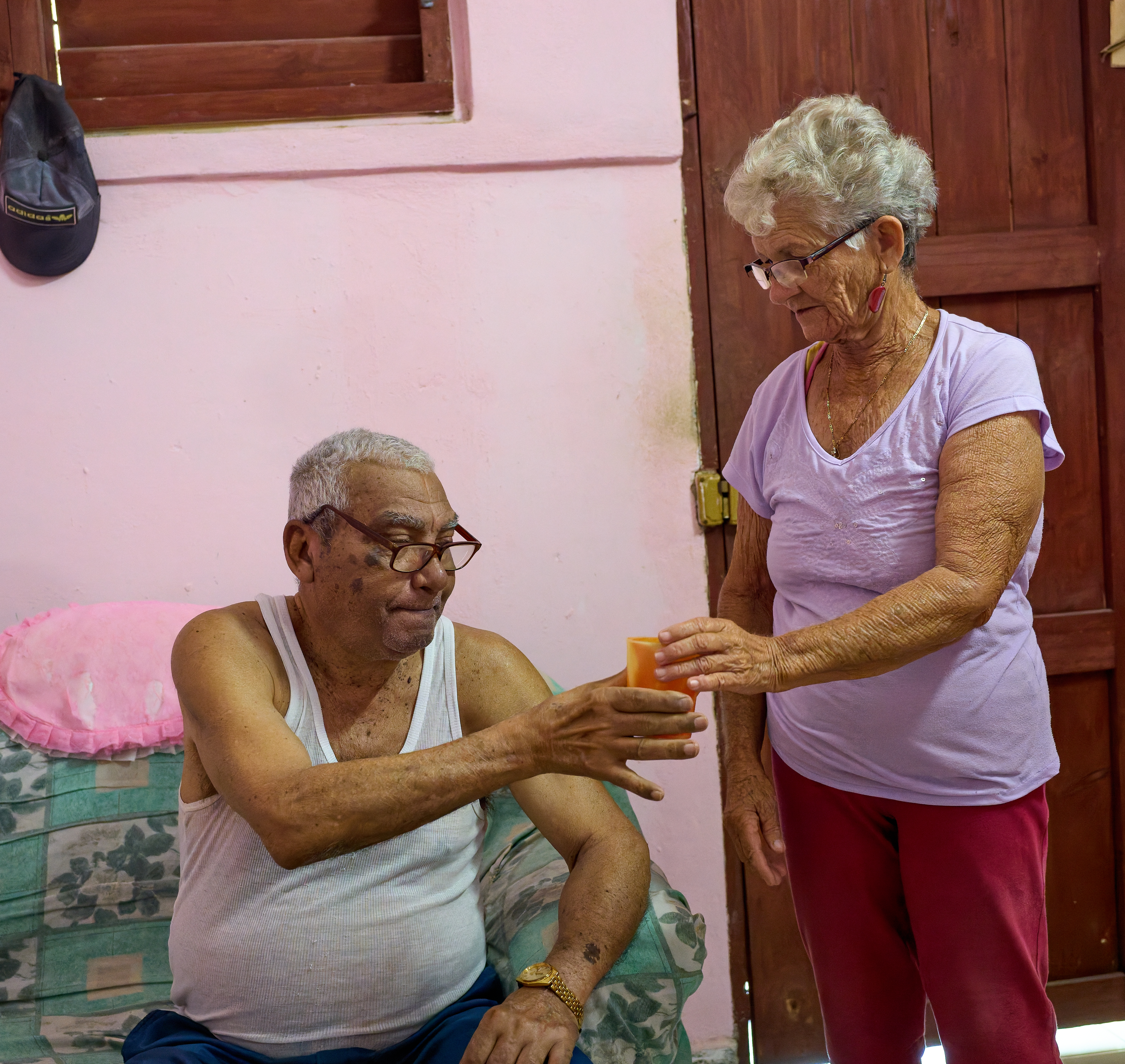 Caregiver:    The wife, acting as a nurse, strained her back muscles while picking up her husband at home. They were isolated for 14 days in the hospital without a phone during the COVID, and even there she had to take the role of nurse due to healthcare shortages. 