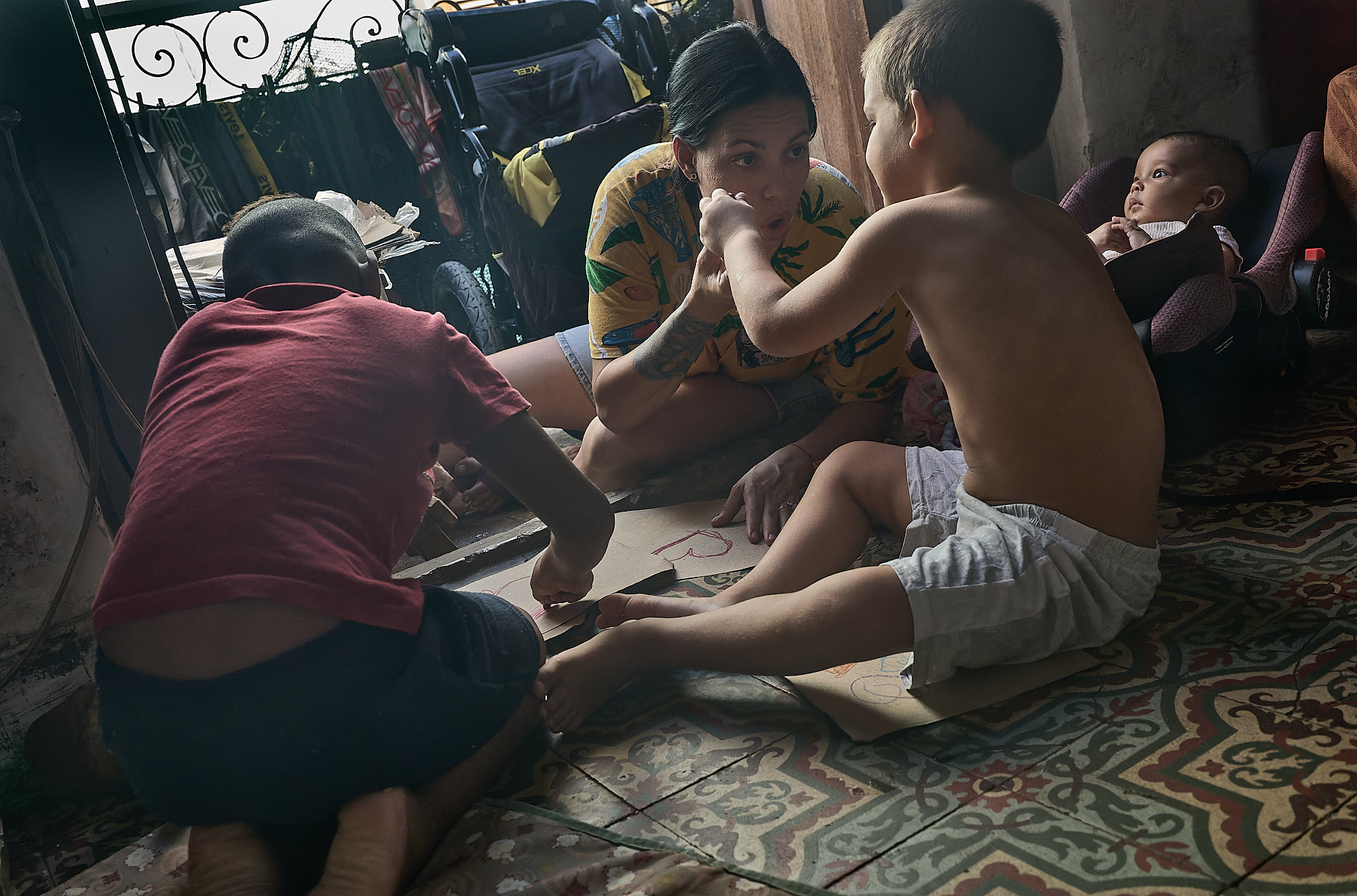 Dori proudly showed off the bundle of scrap paper she found on the street. Today it’s the foundation for a homeschool session — another workaround for a broken school system.