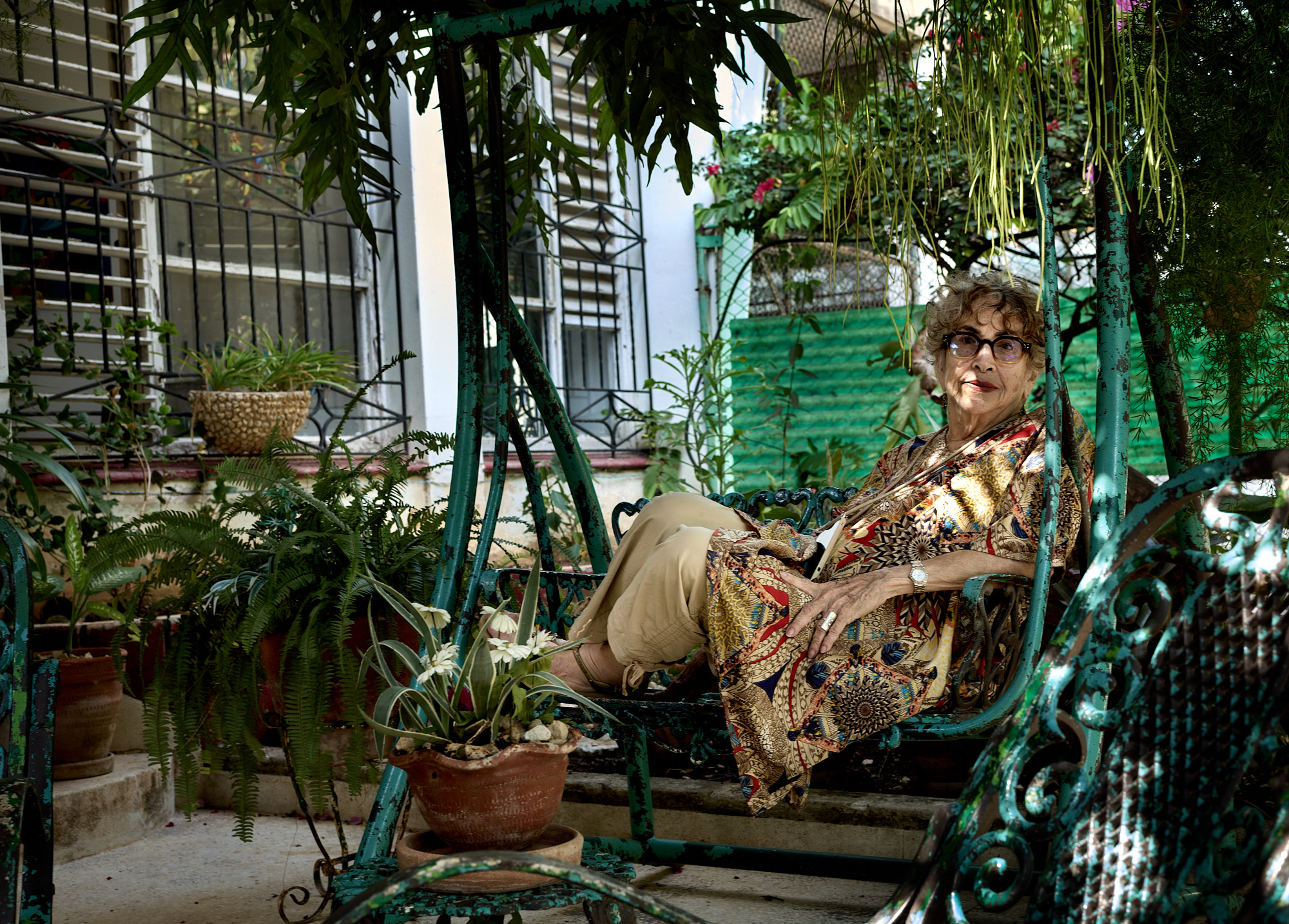  Ileana Yarza on her Havana porch, the place she loved most, pausing in reflection on a lifetime of revolution and resilience.