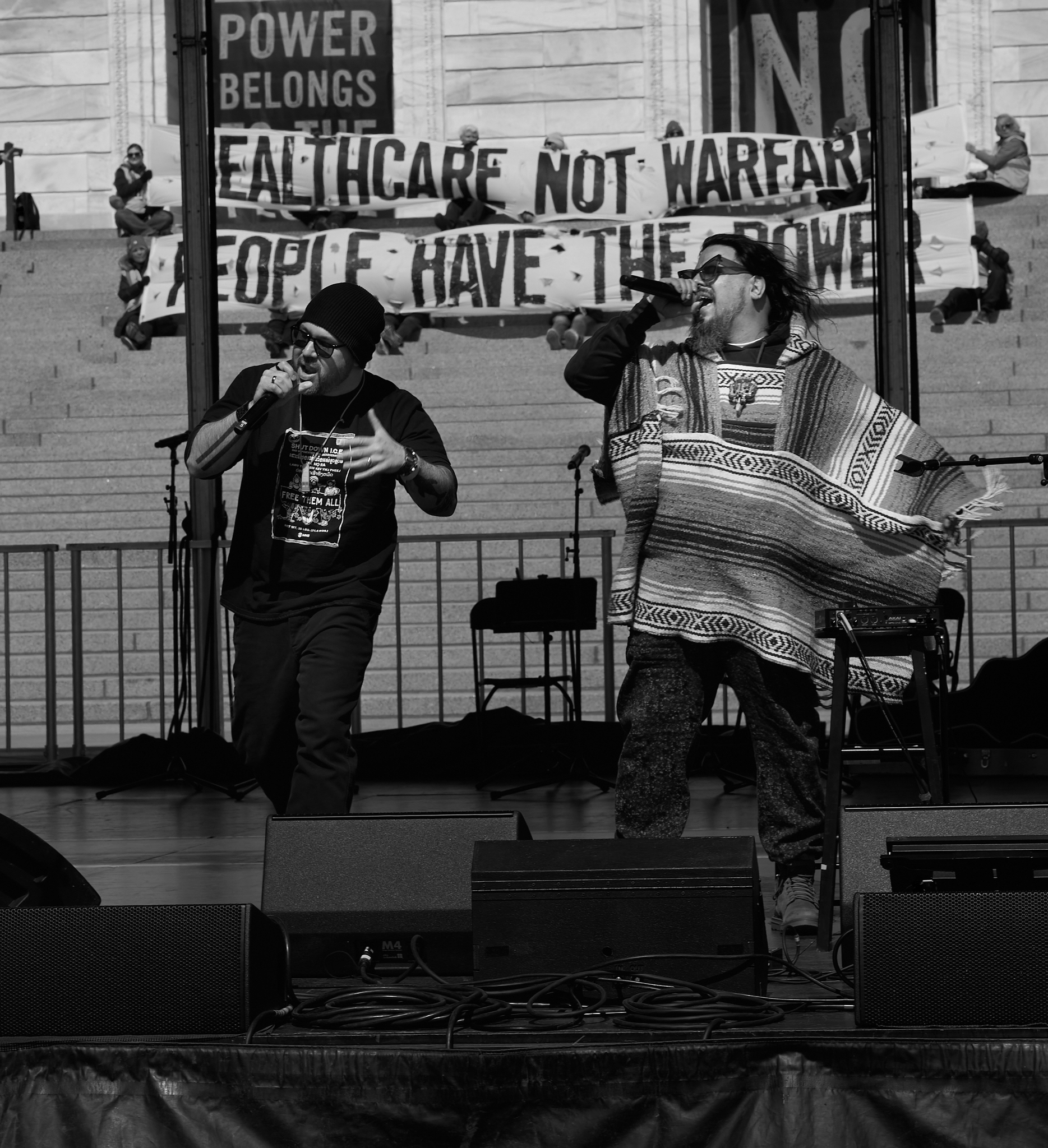 Performers deliver a vocal set during the “No Kings” rally at the Minnesota State Capitol in Saint Paul, Minnesota on March 28, 2026.