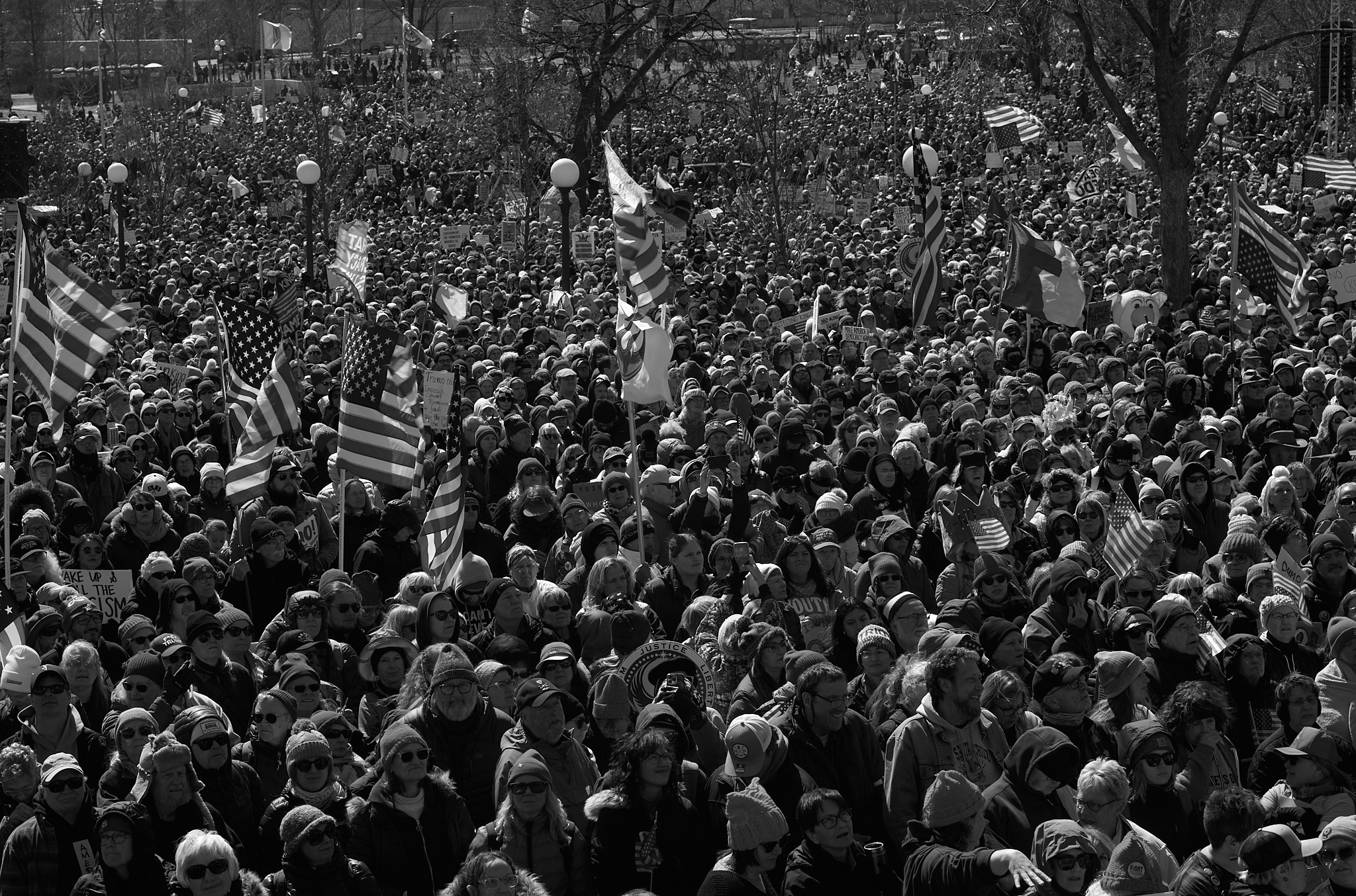 Tens of thousands fill the Minnesota State Capitol Mall in Saint Paul on March 28, 2026, during the “No Kings” rally, the flagship event in a coordinated day of more than 3,200 protests across the United States. Crowd estimates for the St. Paul rally ranged from about 100,000, according to the Minnesota State Patrol, to more than 200,000, according to organizers. The protests also drew international solidarity demonstrations in at least 15 countries.  ￼