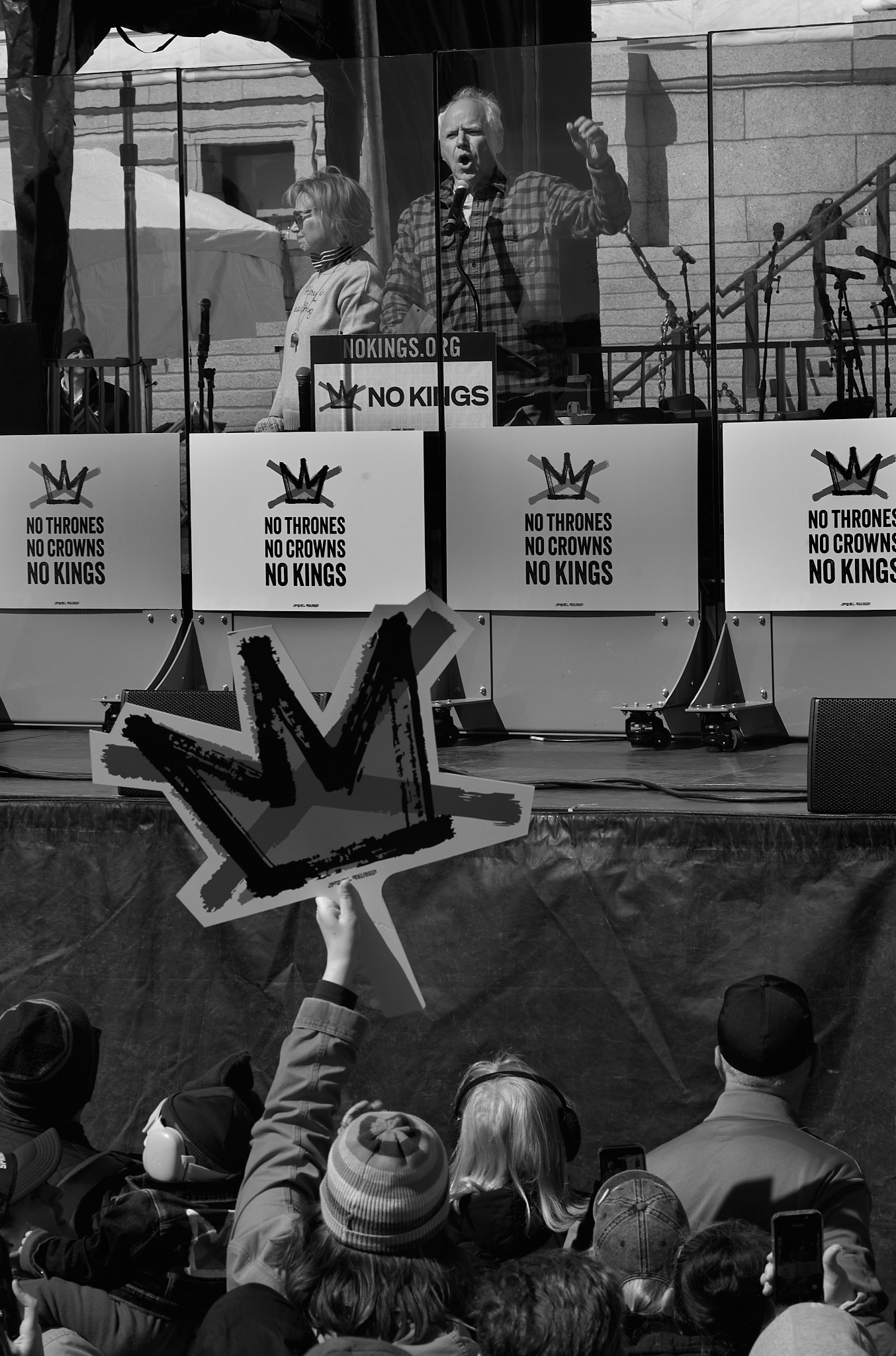 Tim Walz speaks during the “No Kings” rally at the Minnesota State Capitol in Saint Paul, Minnesota on March 28, 2026. In a forceful address, Walz condemned recent federal immigration enforcement actions in Minnesota, called for justice following the deaths of residents during those operations, and urged continued public resistance and community solidarity. The event brought together community leaders, activists, and elected officials advocating for democracy, labor rights, and immigrant protections.
