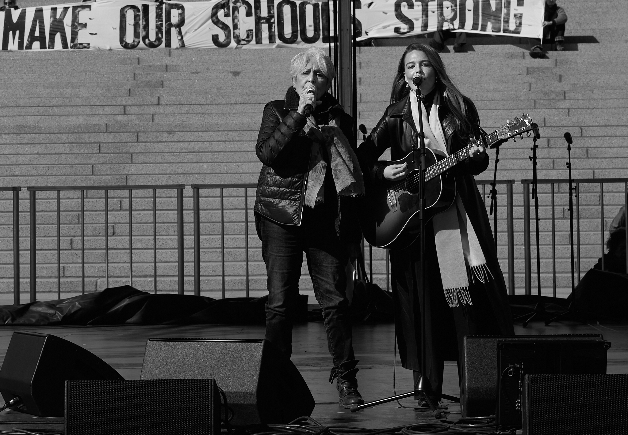 Joan Baez and Maggie Rogers perform together during the “No Kings” rally at the Minnesota State Capitol in Saint Paul, Minnesota on March 28, 2026. The performance brought together generations of musicians.